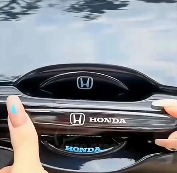 Maçaneta protegida com concha e protetor de puxador transparentes Honda